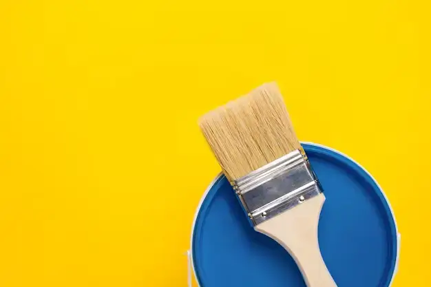 About page image showing paint bucket and brush